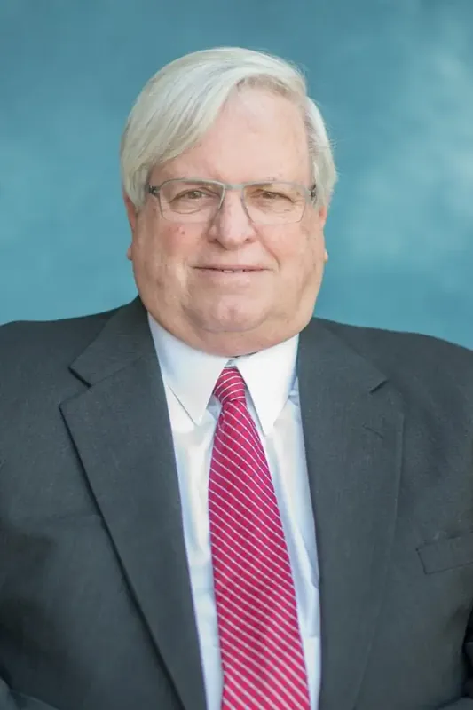 John R. Cook, attorney at Cook Petrella